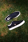 Charger l'image dans la visionneuse de la galerie, Converse Cons X BTL One Star Pro Black / Egret / Pasture pair on grass
