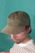 Load image into Gallery viewer, Quasi 6 Panel Hat Eurotext Olive on model
