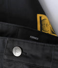 Load image into Gallery viewer, Former Shorts Reynolds 21 Walkshort Black button close up
