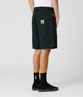 Load image into Gallery viewer, Former Shorts Reynolds 21 Walkshort Black on model back view
