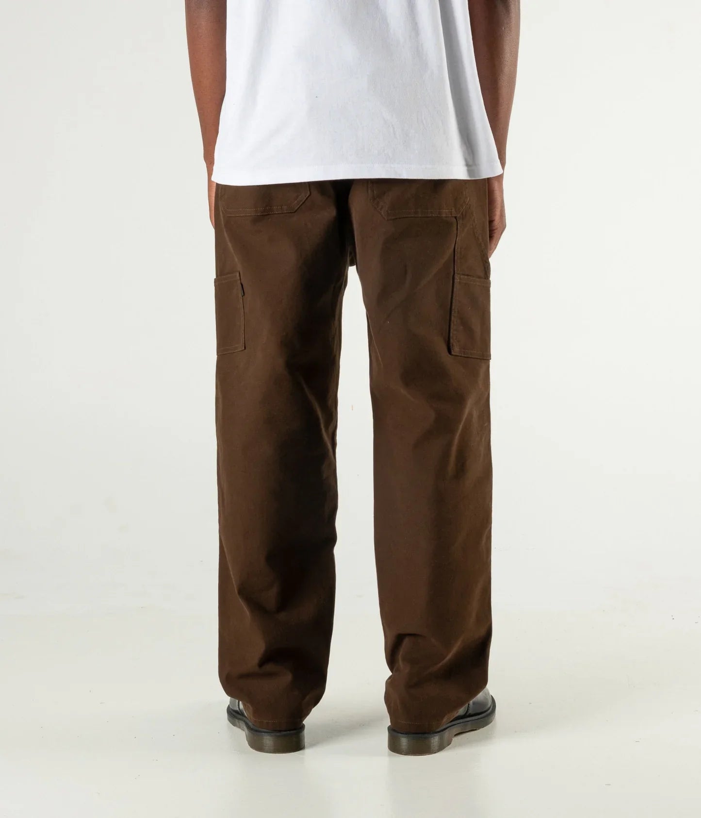 Former Pant Distend VT Brown back view on model