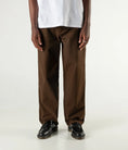 Load image into Gallery viewer, Former Pant Distend VT Brown front view on model
