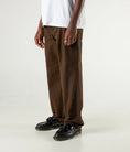 Load image into Gallery viewer, Former Pant Distend VT Brown side view on model
