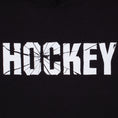 Load image into Gallery viewer, Hockey Hoodie Shatter Puff Print Black graphic close up
